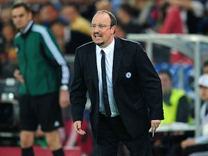 Benitez pleased to secure UCL place