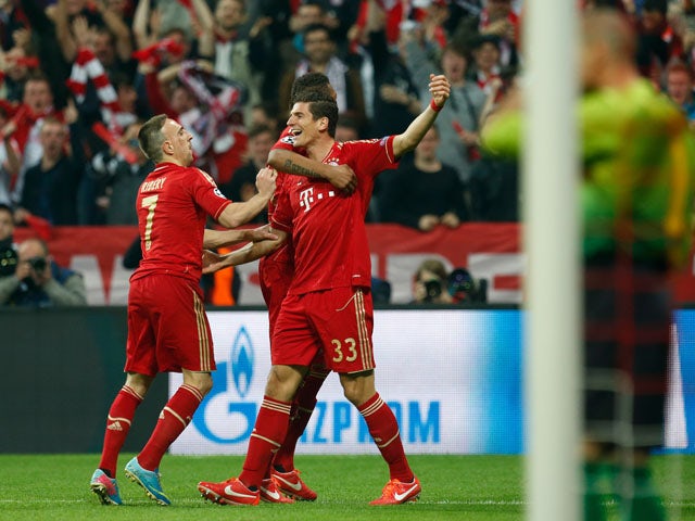 Bayern's Mario Gomez celebrates scoring against FC Barcelona on April 23, 2013