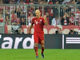 Bayern's Arjen Robben celebrates scoring his side's third goal against Barcelona on April 23, 2013