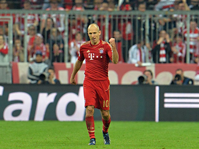 Bayern's Arjen Robben celebrates scoring his side's third goal against Barcelona on April 23, 2013