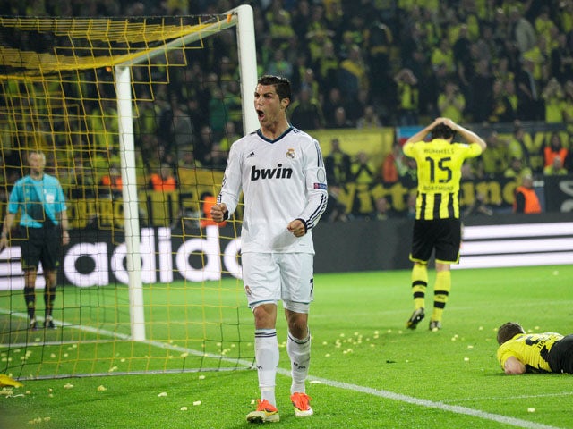Real Madrid's Cristiano Ronaldo celebrates after scoring in the Champions League semi final match against Borussia Dortmund on April 24, 2013