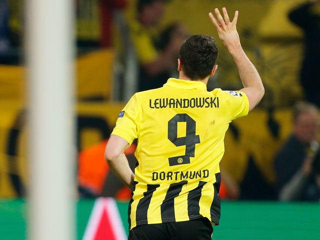 Borussia Dortmund's Robert Lewandowski celebrates scoring his fourth goal in the Champions League semi final against Real Madrid on April 24, 2013