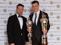 Spurs' Gareth Bale holds his PFA Player of the year and Young player of the year awards on April 28, 2013