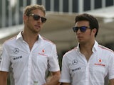 McLaren Formula One driver's Jenson Button and Sergio Perez on March 22, 2013