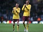 Arsenal's Laurent Koscielny and Per Mertesacker applaud the fans after the match against Aston Villa on November 24, 2012
