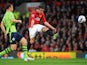 Manchester United's Robin van Persie scores his second goal against Aston Villa on April 22, 2013