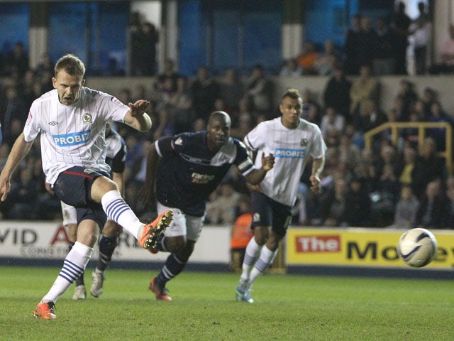 Blackburn Rovers' Jordan Rhodes scores their second goal against Millwall from the penalty spot on April 23, 2013