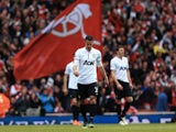 United forward Robin Van Persie walks away after going down 1-0 to former side Arsenal on April 28, 2013