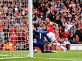 Arsenal's Theo Walcott gives his team an early lead against Man Utd on April 28, 2013