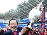 Cardiff chairman Vincent Tan celebrates his team winning The Championship on April 27, 2013