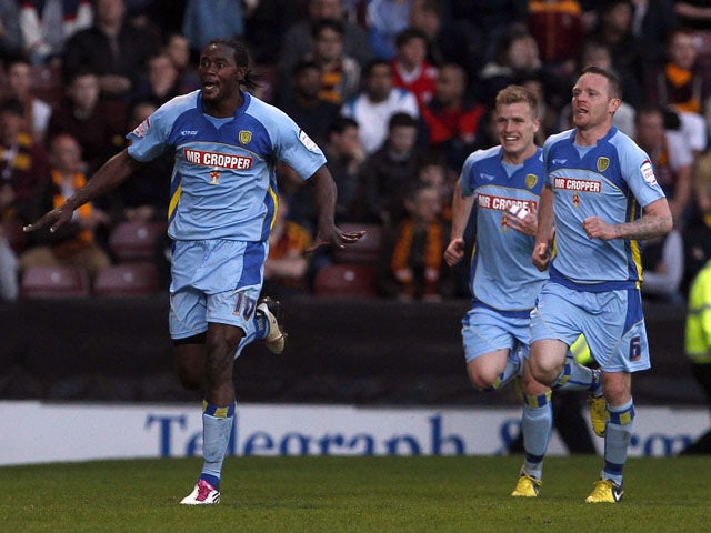 Burton win five-goal thriller