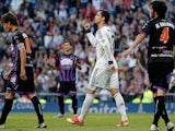 Real's Cristiano Ronaldo scores his team's second during the match against Real Valladolid on May 4, 2013