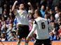 Peterborough United's Lee Tomlin celebrates scoring against Crystal Palace in the Championship clash on May 4, 2013