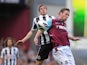 Dan Gosling and Kevin Nolan battle for the ball on May 4, 2013