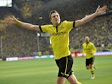 Dortmund's Kevin Grosskreutz celebrates after scoring against Bayern Munich on May 4, 2013