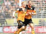 Hull City's Paul McShane celebrates scoring against Cardiff City on May 4, 2013