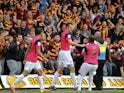 Bradford's James Hanson celebrates after scoring against Burton on May 5, 2013