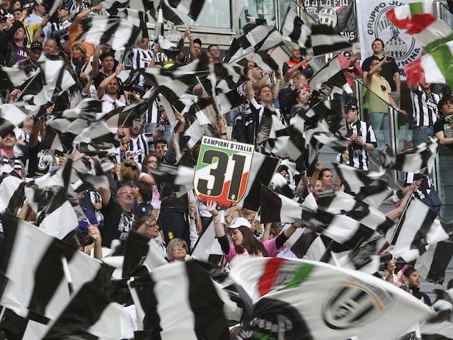 Juventus supporters celebrate their team clinching the Serie A title on May 5, 2013