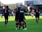 Brentford's Kevin O'Connor is celebrates with team mates after scoring the equaliser through a late penalty on May 4, 2013