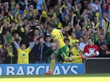 Norwich City's Grant Holt celebrates after scoring against Aston Villa on May 4, 2013