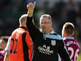 Aston Villa manager Paul Lambert acknowledges the crowd after the match against Norwich on May 4, 2013