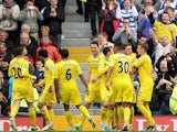 Reading players celebrate in front of fans after their fourth goal against Fulham on May 4, 2013