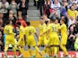 Reading players celebrate in front of fans after their fourth goal against Fulham on May 4, 2013