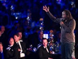 Comedian Reginald D. Hunter performs his stand-up act at the PFA awards on April 28, 2013