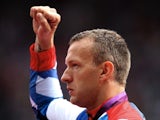 Team GB's Richard Whitehead celebrates his gold medal win in the Paralympic Mens 200m at London 2012