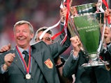 Manchester United manager Alex Ferguson celebrates with the European Cup