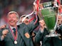 Manchester United manager Alex Ferguson celebrates with the European Cup