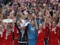 Munich's players celebrate with the Bundesliga trophy on May 11, 2013