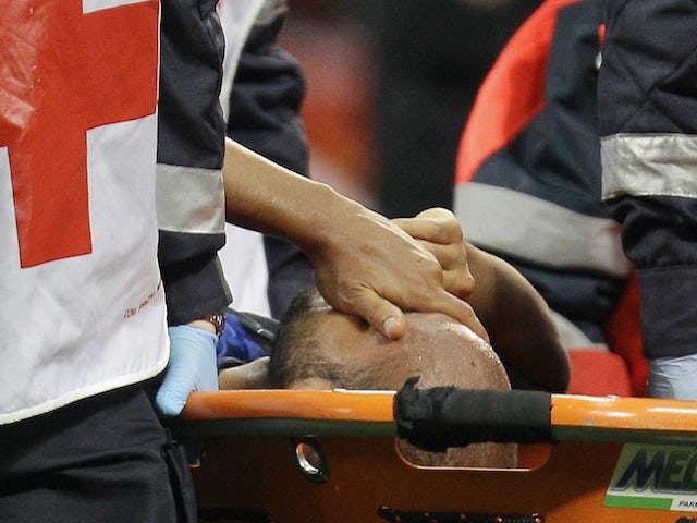 Inter's Jonathan is carried off following an injury during the game with Lazio on May 8, 2013