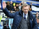 Everton manager David Moyes waves to fans during his last home match in charge of the club on May 12, 2013