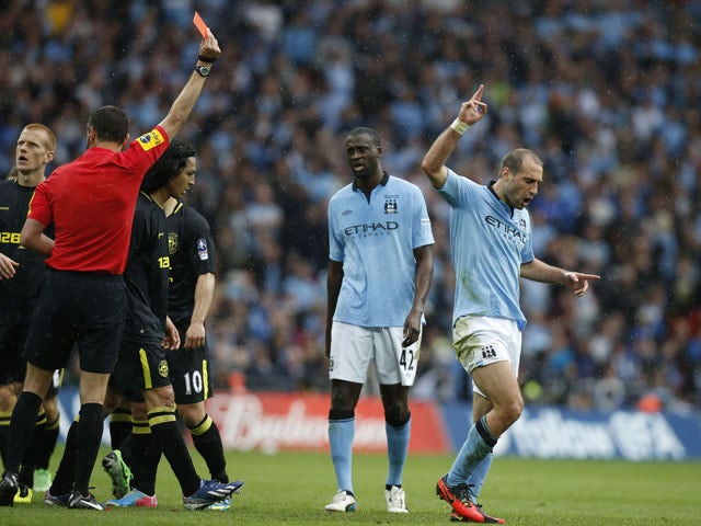 Manchester City's Pablo Zabaleta is shown a red card during the FA Cup Final on May 11, 2013