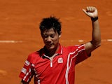 Kei Nishikori celebrates his win over Jurgen Melze in the Madrid Open on May 6, 2013