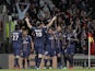 PSG players celebrate their side's goal in the Ligue 1 match against Lyon on May 12, 2013