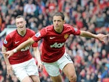 Manchester United's Javier Hernandez celebrates scoring against Swansea on May 12, 2013