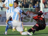 Milan forward Mario Balotelli scores against Pescara on May 8, 2013