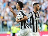 Juventus' Mirko Vucinic celebrates after scoring the equaliser against Cagliari on May 11, 2013