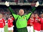 Goalkeeper Peter Schmeichel with his arms aloft after Manchester United win the Champions League in 1999.