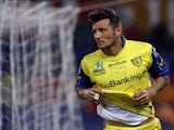 Chievo's Cyril Thereau celebrates scoring against AS Roma on May 7, 2013