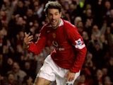 Ruud van Nistelrooy wheels away after scoring for Manchester United.