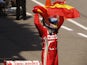 Ferrari driver Fernando Alonso of Spain celebrates his victory after wining the Formula One Spanish Grand Prix on May 12, 2013