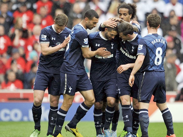Tottenham Hotspur's Clint Dempsey celebrates scoring against Stoke during the Premier League clash on May 12, 2013