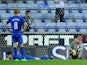 Wigan players look dejected following Swansea City's third goal on May 7, 2013