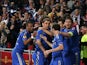Chelsea's Branislav Ivanovic is mobbed by team mates after scoring the late winner against Benfica on May 15, 2013