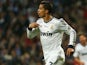 Real Madrid's Cristiano Ronaldo celebrates after scoring the opening goal during the Copa del Rey Final against Atletico Madrid on May 17, 2013