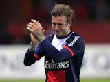 Paris Saint Germain's midfielder David Beckham cries as he leaves the field during his last ever match on May 18, 2013