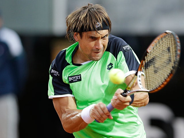 David Ferrer returns the ball to Fernando Verdasco during the Rome Masters on May 15, 2013